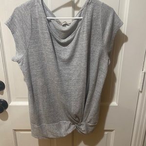Gray knit short sleeved top with knit detail at waist